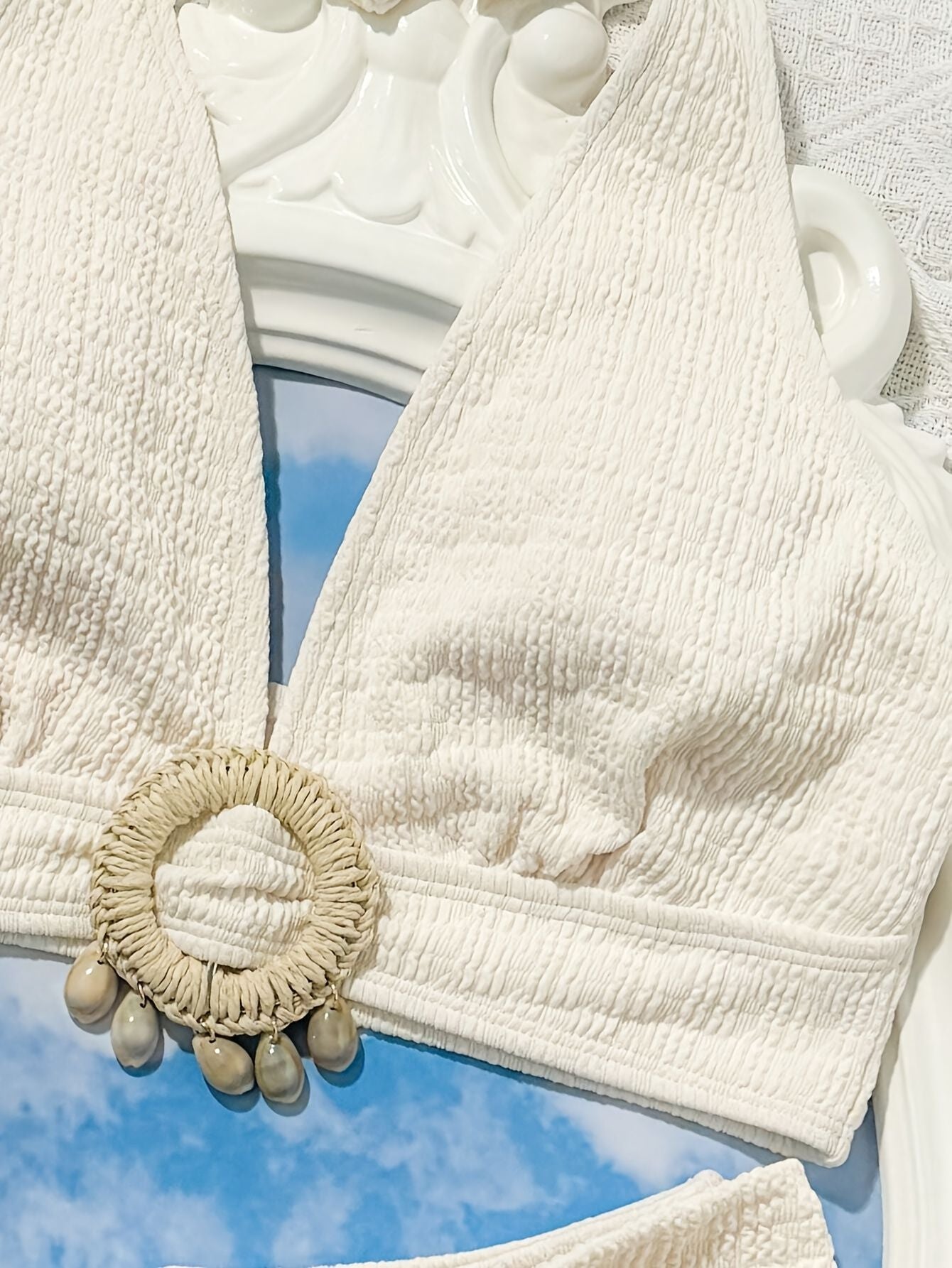 Ladies' white split beach bikini swimwear with shell embellishment, elegant and sexy