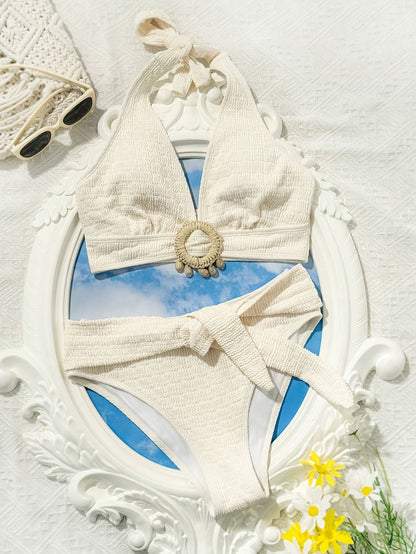 Ladies' white split beach bikini swimwear with shell embellishment, elegant and sexy