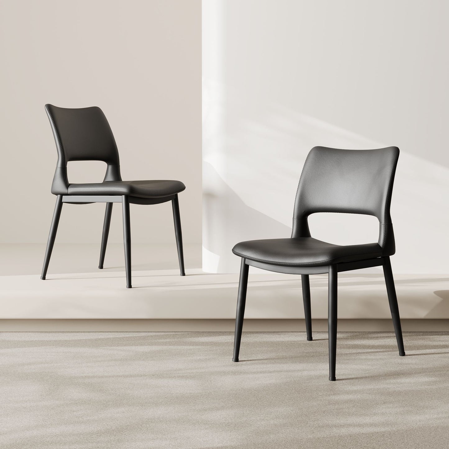 Modern minimalist black PU leather Dining Chairs Set of 2, comfortable backrest design, metal leg support, suitable for restaurants, kitchens, and offices.