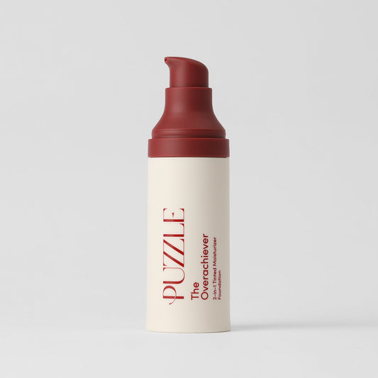 Tinted moisturizer foundation bottle with red pump and off-white label
